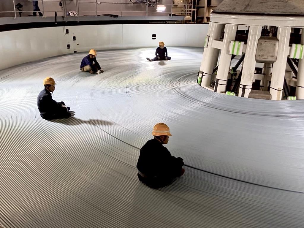 The JGA North cable being loaded in to the cable tank onboard the cable laying vessel